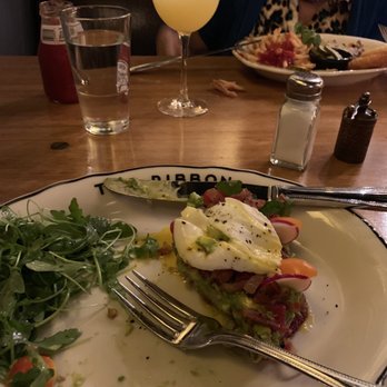 Bacall's - Avocado Toast with poached egg on top - New American Near Me - New York, New York