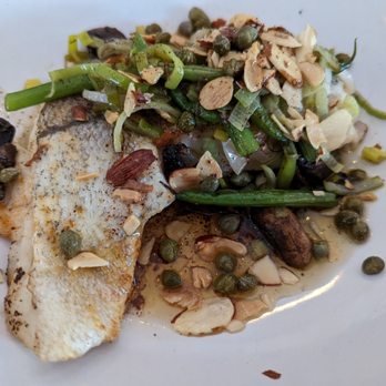 Salty Sow - New England Haddock special - oven-roasted haddock with leeks, thin beans, mushroom, capers, and toasted almond brown butter - American Near Me - Austin, Texas