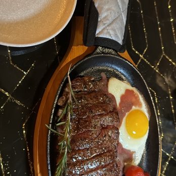 Alchemist Bar and Restaurant - Jumping beef (Vietnamese ribeye steak with egg) - Asian Fusion Near Me - Las Vegas, Nevada Alchemist Bar and Restaurant - Jumping beef (Vietnamese ribeye steak with egg) - Asian Fusion Near Me - Las Vegas, Nevada