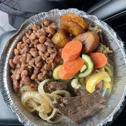 House Kitchen - Rice and beans, veggies, bistec encebollado, pernil and maduros