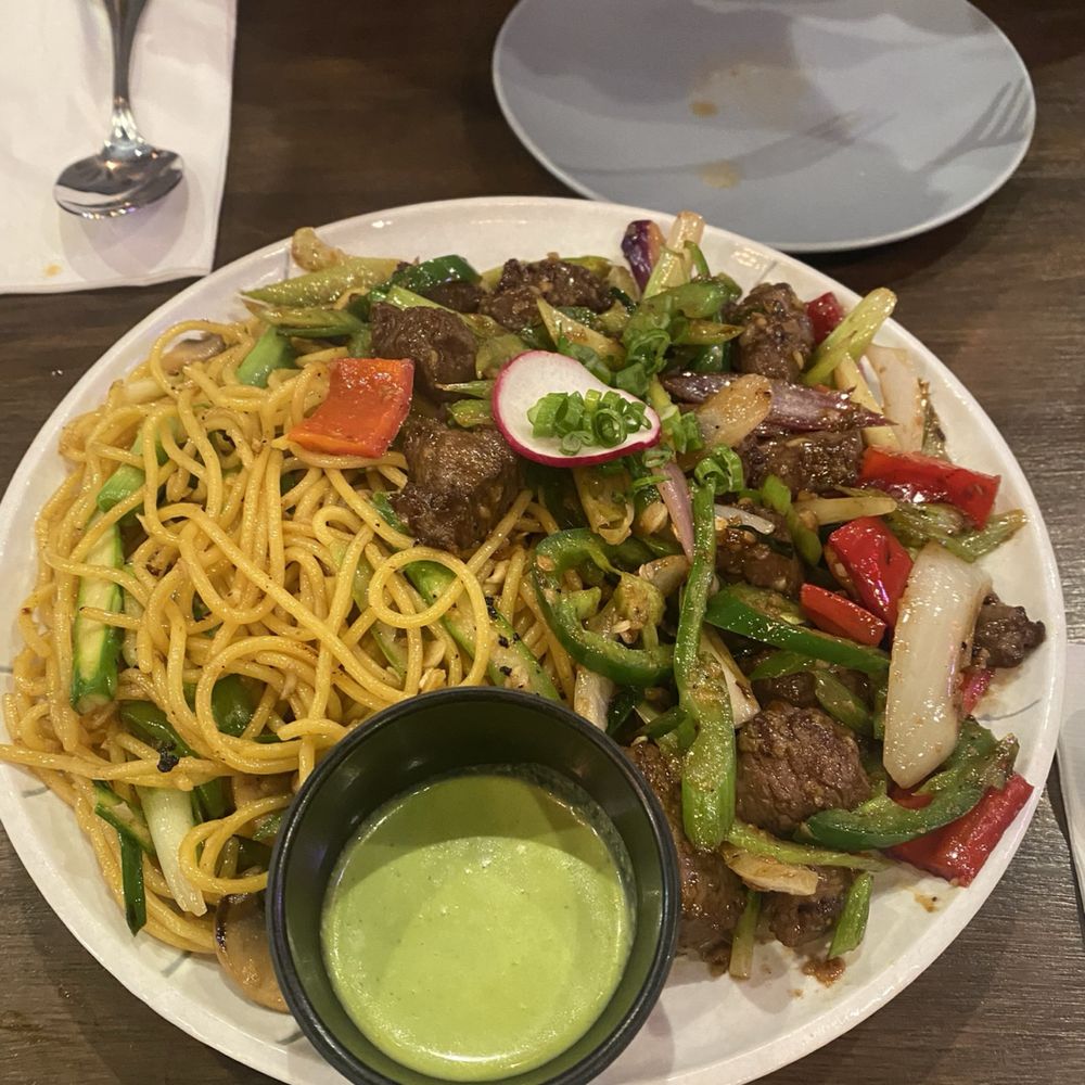 OMELI Kitchen - garlic noodles with beef - Vietnamese Near Me - Fullerton, California OMELI Kitchen - garlic noodles with beef - Vietnamese Near Me - Fullerton, California