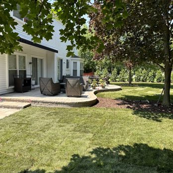 Reliable Landscaping Inc - Patio with tree line and steps from sidewalk - Landscaping Near Me - Canton, Michigan Reliable Landscaping Inc - Patio with tree line and steps from sidewalk - Landscaping Near Me - Canton, Michigan