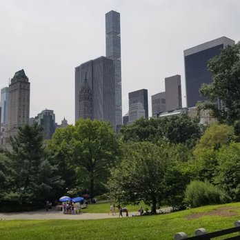 Central Park Conservancy - Tall building surrounded Central Park - Parks Near Me - New York, New York