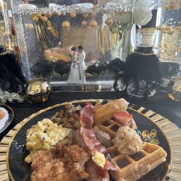 chicken sausage,fried chicken and waffles, bacon, Scrambled eggs, Country potatoes chicken sausage,fried chicken and waffles, bacon, Scrambled eggs, Country potatoes