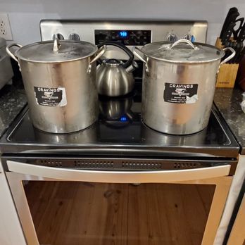 Coastal Cravings - pots and pans on a stove - Seafood Near Me - Duck, North Carolina Coastal Cravings - pots and pans on a stove - Seafood Near Me - Duck, North Carolina