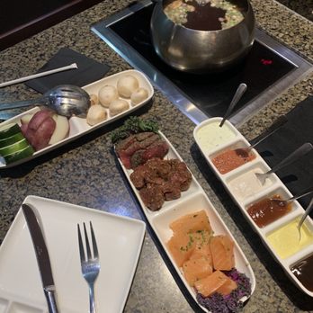 The Melting Pot - Brown Sugar Bourbon Rub Steak Garlic Pepper Steak Atlantic Salmon - Fondue Near Me - Minneapolis, Minnesota The Melting Pot - Brown Sugar Bourbon Rub Steak Garlic Pepper Steak Atlantic Salmon - Fondue Near Me - Minneapolis, Minnesota