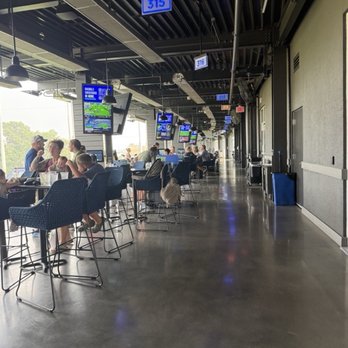 Topgolf - Bay walkway - Sports Bars Near Me - Woodbury, Minnesota Topgolf - Bay walkway - Sports Bars Near Me - Woodbury, Minnesota