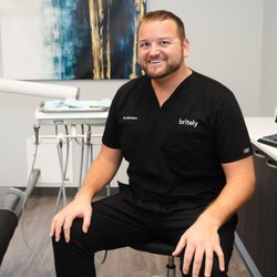 Britely Dentures + Implants Studio - Dr. Nick Bussa