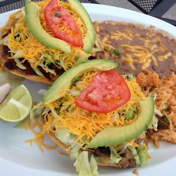 Paleteria La Reyna - Tostadas with al pastor (l.) and barbacoa (r.). - Ice Cream & Frozen Yogurt Near Me - Wichita, Kansas