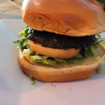The Lazy Lizard - Portobello sammie made vegan - Bars Near Me - Hernando Beach, Florida