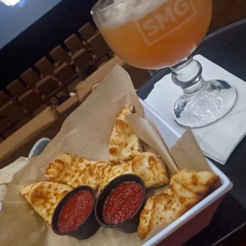 Studio Movie Grill - Cheesy Bread and XL Caribbean Hurricane - Cinema Near Me - Kissimmee, Florida