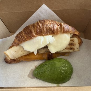 Uncharted Adventures Cafe - Turkey & Cheese Croissant with egg & avocado - Coffee & Tea Near Me - Bakersfield, California