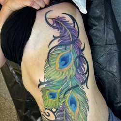 Royal Ave Tattoo & Body Piercing - Peacock feathers
