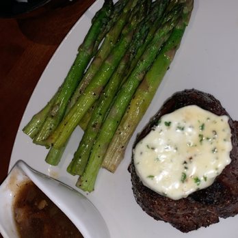 Stoney River - Petite cut filet with sautéed asparagus, & mushroom madeira sauce - Steakhouses Near Me - Troy, Michigan Stoney River - Petite cut filet with sautéed asparagus, & mushroom madeira sauce - Steakhouses Near Me - Troy, Michigan