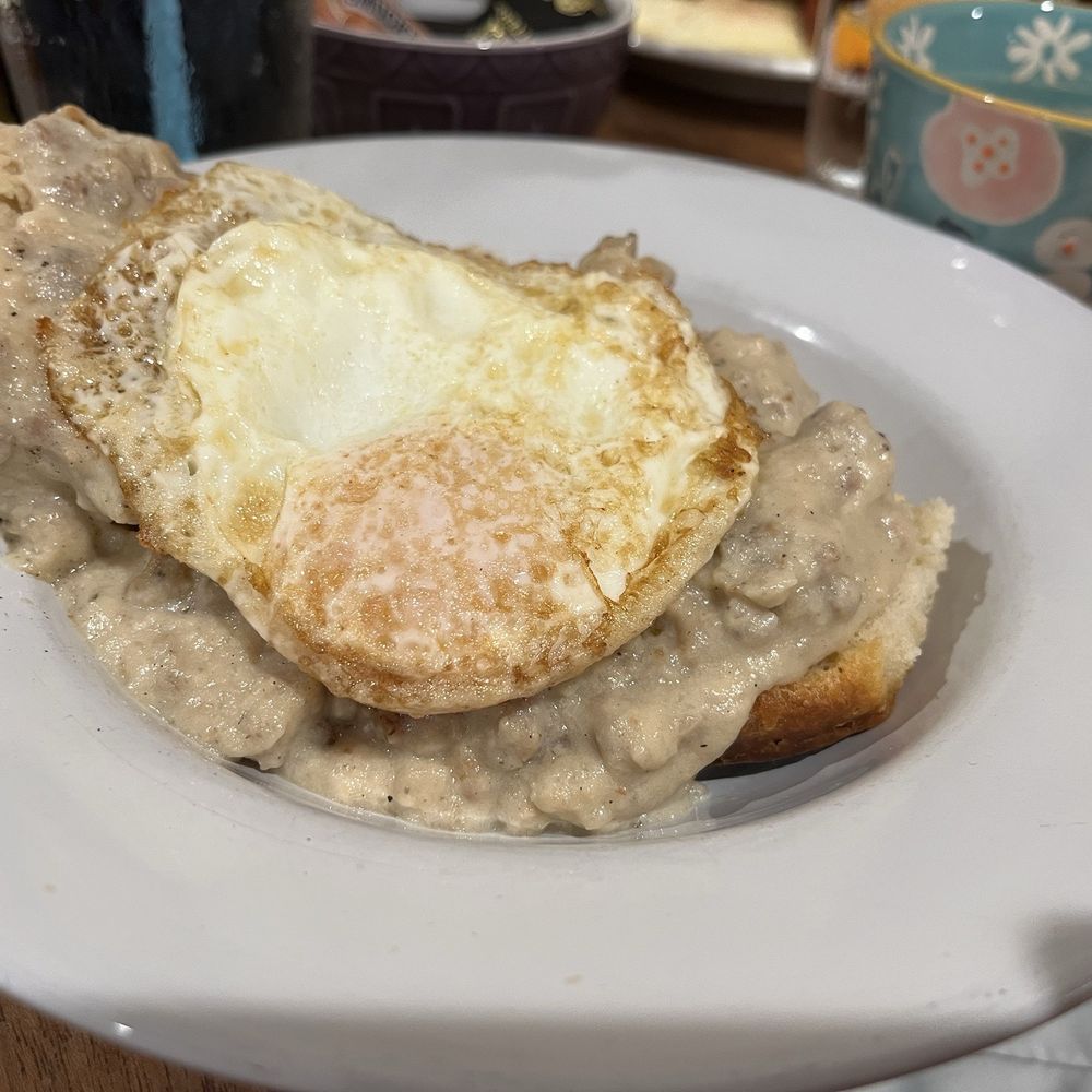 Floozies Pie Shop - 1 biscuit topped with sausage gravy and 1 over easy egg - Desserts Near Me - Louisa, Virginia Floozies Pie Shop - 1 biscuit topped with sausage gravy and 1 over easy egg - Desserts Near Me - Louisa, Virginia