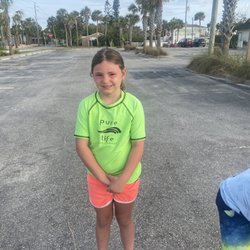 Pure Life Surf School - Happy girl