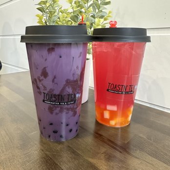Toastn' Tea - Ube milk tea with tapioca pearls and passionfruit pea tea lemonade refresher with rainbow jellies - Bubble Tea Near Me - Grand Rapids, Michigan Toastn' Tea - Ube milk tea with tapioca pearls and passionfruit pea tea lemonade refresher with rainbow jellies - Bubble Tea Near Me - Grand Rapids, Michigan