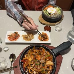 Bi bim bap, squid and pork belly, and the Side Dish Trio (Banchan) Bi bim bap, squid and pork belly, and the Side Dish Trio (Banchan)