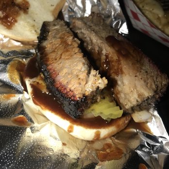 Rollin Smoke BBQ - A lil close up of the brisket sammy - Barbeque Near Me - Austin, Texas Rollin Smoke BBQ - A lil close up of the brisket sammy - Barbeque Near Me - Austin, Texas
