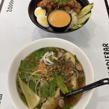 Doodle Noodle Bar - Too Many Dumplings (front) and Peppa Pig Bowl (back) - Ramen Near Me - Tampa, Florida Doodle Noodle Bar - Too Many Dumplings (front) and Peppa Pig Bowl (back) - Ramen Near Me - Tampa, Florida