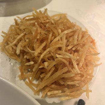 Le Crocodile Restaurant - Pomme frites served to the table between courses - French Near Me - Vancouver, British Columbia
