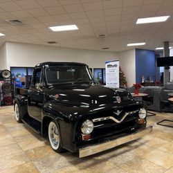 A picture of a classic Ford F-100 pickup truck in our Helena Toyota showroom!