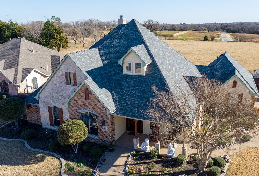 Slide of Frazier Roofs and Gutters