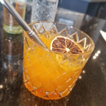 Karma Modern Indian - Turmeric and ginger non-alcoholic beverage - Indian Near Me - Washington, DC, District of Columbia Karma Modern Indian - Turmeric and ginger non-alcoholic beverage - Indian Near Me - Washington, DC, District of Columbia