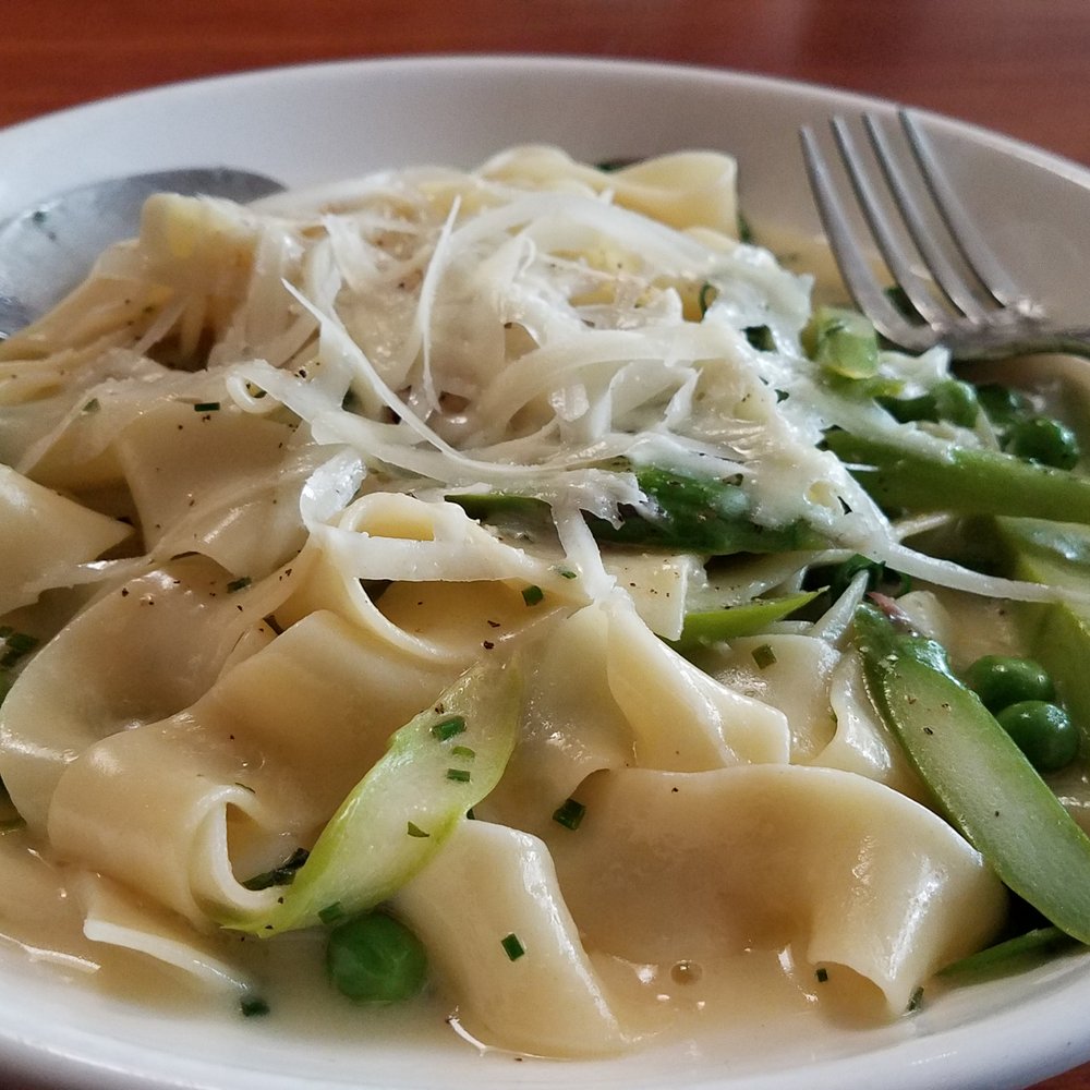 Capers + Olives - Tagliatelle- asparagus, english peas, creme friache, chive $13 (lunch). Peas a little bitter but pasta and sauce were great. - Italian Near Me - Everett, Washington
