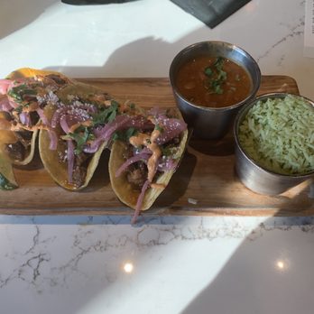 Local Lime | Rogers - Carnitas tacos with 2 sides - cilantro rice and drunken baked beans. - Mexican Near Me - Rogers, Arkansas Local Lime | Rogers - Carnitas tacos with 2 sides - cilantro rice and drunken baked beans. - Mexican Near Me - Rogers, Arkansas