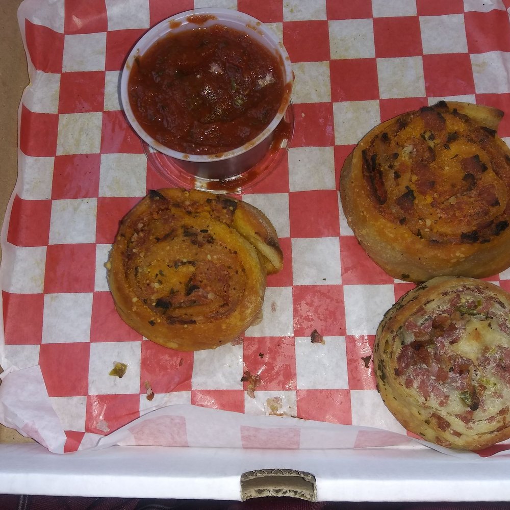 Roppolo's Pizzeria - 2 pepperoni rolls 1 Ham & Jalapeno roll Spicy marinara sauce - Pizza Near Me - Austin, Texas Roppolo's Pizzeria - 2 pepperoni rolls 1 Ham & Jalapeno roll Spicy marinara sauce - Pizza Near Me - Austin, Texas