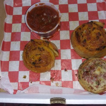 Roppolo's Pizzeria - 2 pepperoni rolls 1 Ham & Jalapeno roll Spicy marinara sauce - Pizza Near Me - Austin, Texas Roppolo's Pizzeria - 2 pepperoni rolls 1 Ham & Jalapeno roll Spicy marinara sauce - Pizza Near Me - Austin, Texas