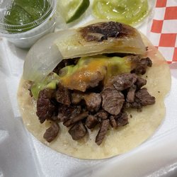 Berrinchuda Taqueria - Asada taco with grilled white onion and salsa.