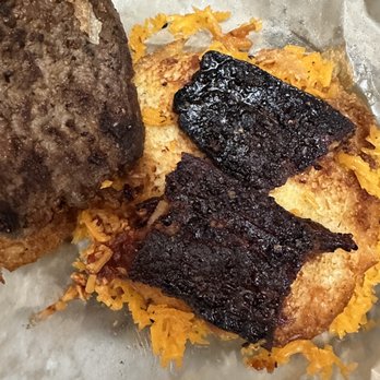District Donuts Sliders & Brew - Yes, that's the burned bacon on a burger. Can you believe that we were actually sent that food? - Donuts Near Me - New Orleans, Louisiana District Donuts Sliders & Brew - Yes, that's the burned bacon on a burger. Can you believe that we were actually sent that food? - Donuts Near Me - New Orleans, Louisiana