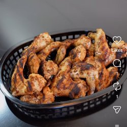 Instagram post. Whole wings advertised. Wing Dings in caption.