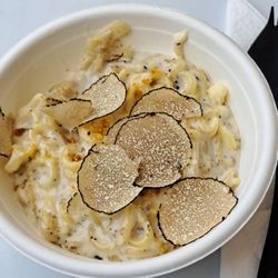 Taste of Paris - Anellini pasta, sauce Grana Padano AOF et truffe noire uncinatum.  Anellini (ring shaped), Grana Padano cheese, black truffle. 2026 05 23.