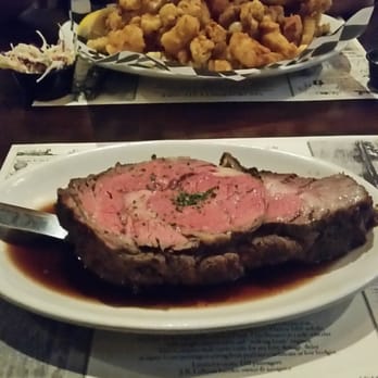 Brack’s Tavern - My prime rib (Tom Brady cut) on the bottom and Hubby's seafood platter on top. - Sports Bars Near Me - Middleboro, Massachusetts