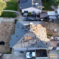 Platinum Roofing - Removing warn out shingles.