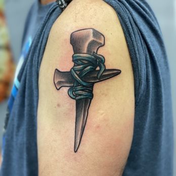 The Body Art Gallery - Spike Cross with. And - Tattoo Near Me - Mishawaka, Indiana The Body Art Gallery - Spike Cross with. And - Tattoo Near Me - Mishawaka, Indiana