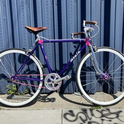 Custom built wheels, new crank set, and a few of the original parts