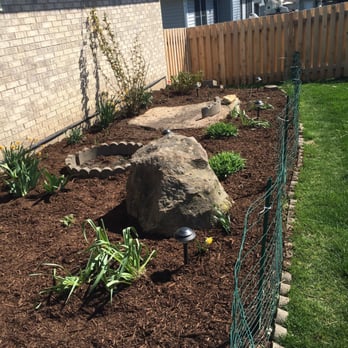 Ultimate Landscaping - a rock in a garden - Landscaping Near Me Ultimate Landscaping - a rock in a garden - Landscaping Near Me