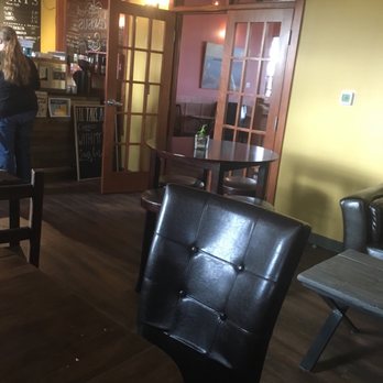 Versus Cafe & Catering - a woman at a counter - Coffee & Tea Near Me - Calmar, Alberta