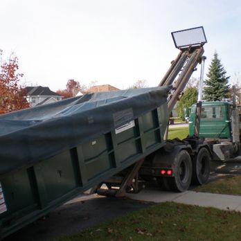 ARS Dumpster Rental - 20 yard dumpster rolling off truck. - Dumpster Rental Near Me - Hawthorn Woods, Illinois ARS Dumpster Rental - 20 yard dumpster rolling off truck. - Dumpster Rental Near Me - Hawthorn Woods, Illinois