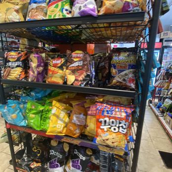 Metro Mart - a shelf of chips and snacks - Convenience Stores Near Me - Providence, Rhode Island