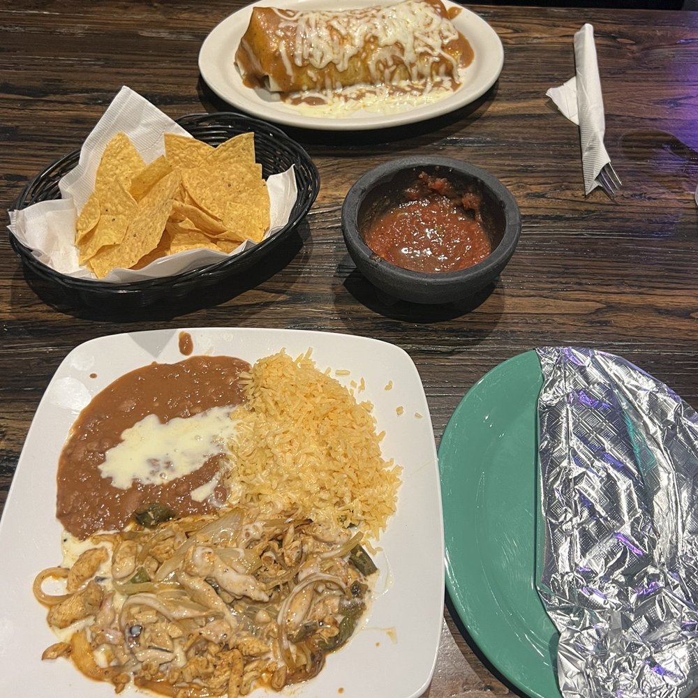 Los Amigos - Pollo fundido in the foreground and the steak burrito in the background - Mexican Near Me - Waynesville, North Carolina