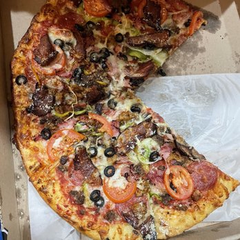Mellow Mushroom Athens - a half eaten pizza - Pizza Near Me - Athens, Georgia Mellow Mushroom Athens - a half eaten pizza - Pizza Near Me - Athens, Georgia