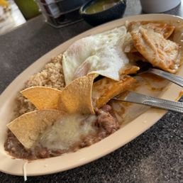 Chilaquiles with eggs and rice and beans Chilaquiles with eggs and rice and beans