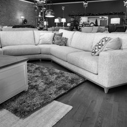 Wood & Nails Furniture - Sleek and stylish this modern sectional is sure to be the center of attention in any room.