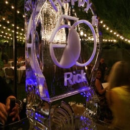 They made a luge off the side so the bartender could pour shots, and drinks into a martini glass off the ice.