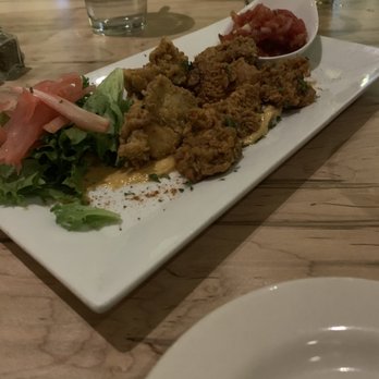 Rockfish Food and Wine - Crispy oyster appetizer. Salsa w oyster makes a nice pairing - Seafood Near Me - Roanoke, Virginia Rockfish Food and Wine - Crispy oyster appetizer. Salsa w oyster makes a nice pairing - Seafood Near Me - Roanoke, Virginia